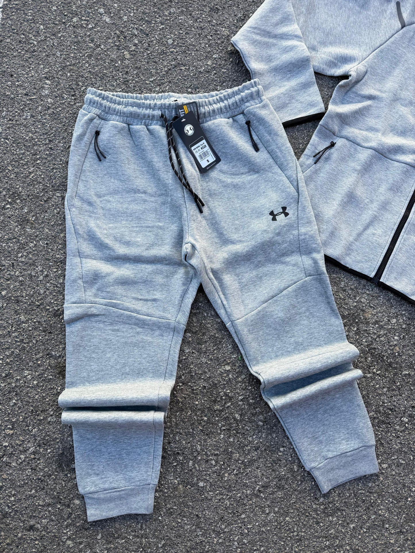 Conjunto Under Armour 2026 Grey
