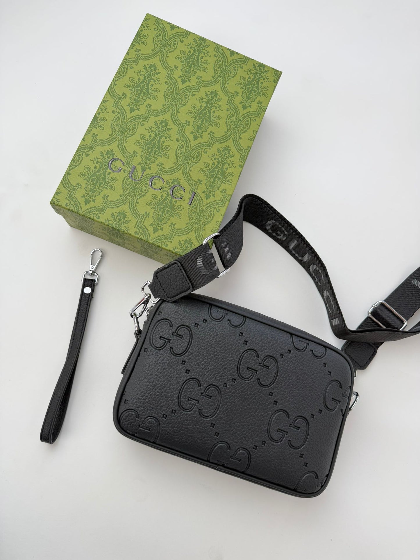 Bolso Gucci GG Embossed Mini Negro